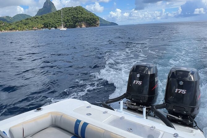 Private Boat Charter St. Lucia, boat tour to Soufriere. Full day - Anse Chastanet finishes with black sand