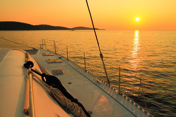 Private Catamaran Sunset Cruise from St Lucia for Up to 15 Guests - Cruising past Pigeon Island as the light changes