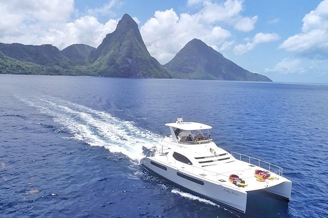 Private Luxury Catamaran Cruise in St. Lucia - Castries fades into the coastal view