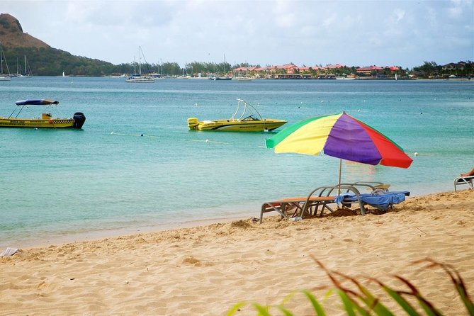 Reduit Beach Round-Trip Shuttle Service - Chairs, Shade, And Beach Costs