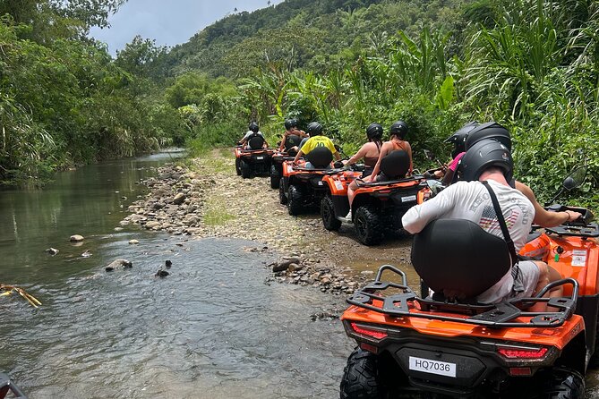 St Lucia ATV Tour : Waterfall, Plantation, Beach and Distillery - Cruising Roseau Beach and stopping at Clive’s