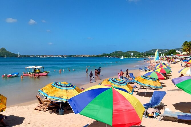 St. Lucia Beach Day with Paradise Beach Comforts & Transportation - The included drink, and what you still pay for